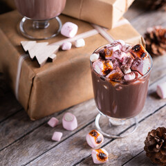Traditional Christmas drink, hot cocoa chocolate with roasted marshmallows