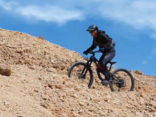 Mountain biker in the mountains of Timna park