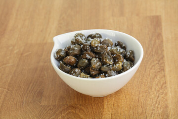 Salted marinated capers snack appetiser