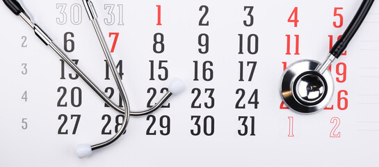 Stethoscope with calendar page date. Doctor appointment medical concept 