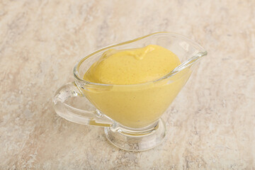 Organic mustard sauce in the bowl