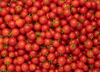 fresh cherry tomatoes as background