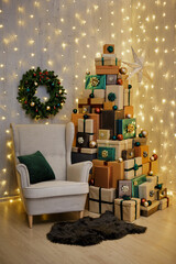 Decorated living room with armchair, led lights and Christmas gift boxes laid out in the shape of a Christmas tree