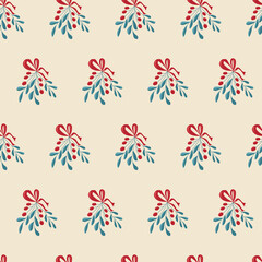 Seamless festive pattern of mistletoe branches on beige background. Vector illustration for background, decor, fabrics and postcards