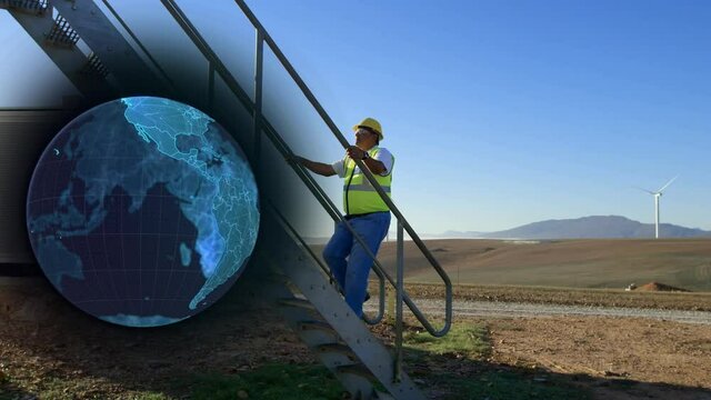 Animation of globe over engineer and wind turbine in countryside