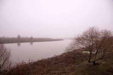 The Kura river in the fog. The city of Neftechala. Azerbaijan.