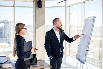 Fototapeta premium Business people meet in the office and discuss joint business projects. Business partnership concept.