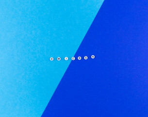 omicron text on blue background with lines