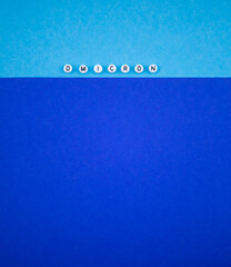 omicron letters on blue background