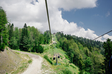 cable car in the mountains. summer tourism.