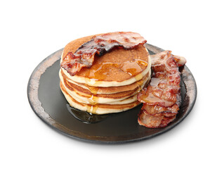 Delicious pancakes with maple syrup and fried bacon on white background