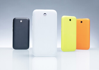 Mock up of multicolored smartphones. Bright phones in modern life.
