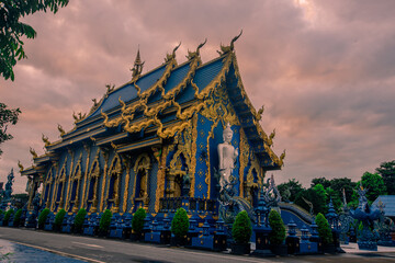 Fototapeta na wymiar Background Chiang Rai Blue Temple or Wat Rong Seua Ten is located in Rong Suea Ten in the district of Rimkok a few kilometers outside Chiang Rai,Thailand