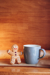 Festive Christmas composition of gingerbread cookies in the shape of a man. Background for your greeting cards with space for your text