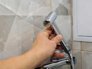 The bidet. shower for hygiene and cleansing the body with water.The concept of cleanliness and human health.