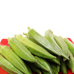 Fresh young okra isolated on white background