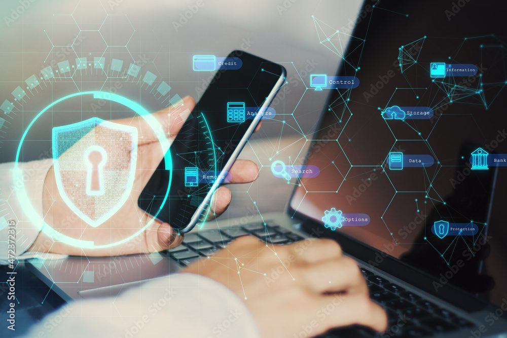 Poster side view and close up of hand using laptop and smartphone with creative digital padlock interface o
