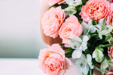 Luxurious bouquet of fresh pastel pale pink roses