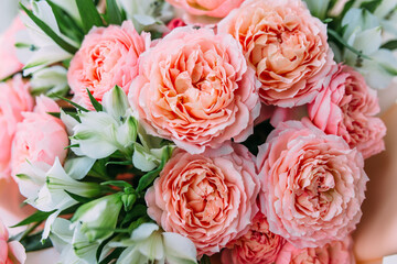 Luxurious bouquet of fresh pastel pale pink roses