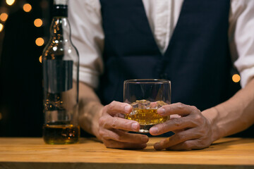 Barman pouring whiskey whiskey glass beautiful night