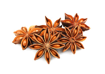 Dry anise stars with seeds on white background
