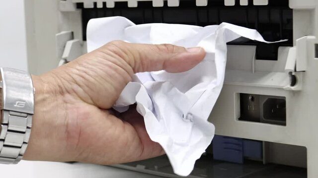 Paper Stuck, Paper Jam In Printer At Office concept office equipment problem