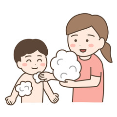 シャワーで子どもについた泡や汚れを洗い流すお母さん