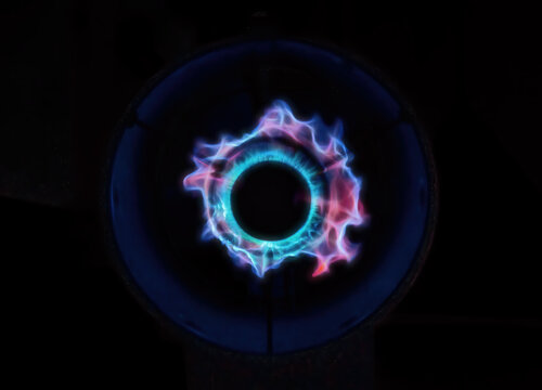 Blue gas-ring on black background.
