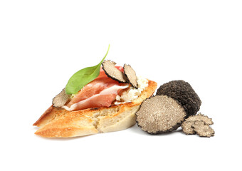 Tasty bruschetta with prosciutto and truffle on white background