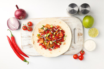 Concept of tasty food with taco on white background