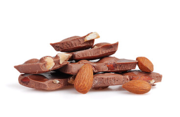 Broken chocolate bar with almonds isolated on white background