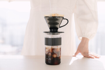 Drip coffee,Drip kettle,Black coffee make a coffee White scene