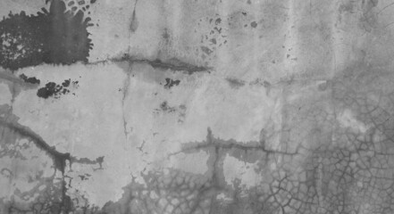 Horizontal dark old cement wall for the background, Texture of a grungy black concrete wall as background.