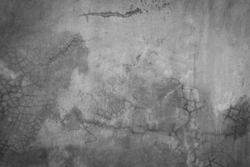 Horizontal dark old cement wall for the background, Texture of a grungy black concrete wall as background.