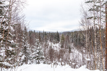 Winter landscape. Black rock, Taganay national Park, Zlatoust city, Chelyabinsk region, South Ural, Russia.