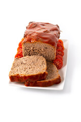 Traditional American meatloaf with ketchup isolated on white background.	