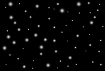 Drawing of snowflakes on a black background.