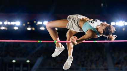Wandaufkleber High Jump Championship: Professional Female Athlete on World Championship Successfully Jumping over Bar. Shot of Competition on Stadium with Sports Achievement Experience. Determination of Champion. © Gorodenkoff