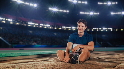 Long Jump Championship: Professional Male Athlete Jumping on Long Distance. Determination,...