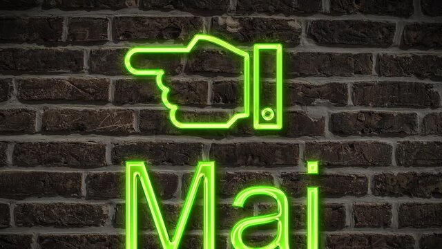 Detailansicht einer Leuchtreklame an einer Mauer mit der Aufschrift Mai 