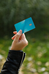 Woman hand holding credit card  for shopping online. Online payment concept