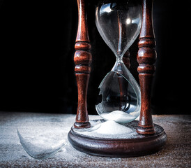 Broken hourglass - sand clock                      
