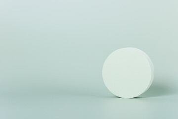 Fototapeta na wymiar Round shape on light green background
