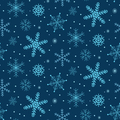 Abstract light  blue snowflakes seamless pattern over navy blue . Great for Christmas gift wrapping paper, greeting cards, home décor and  textile 