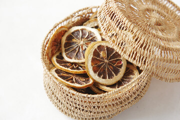 close up of dry lemon in a bow on table 