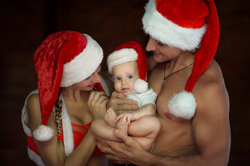 Family in Christmas Hat, Baby, Mother and Father