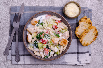 Traditional pasta with poultry and vegetables