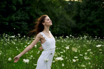 pretty woman in white dress field flowers freedom nature