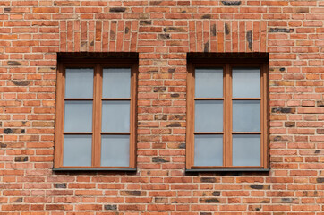 Fototapeta na wymiar brick wall with windows