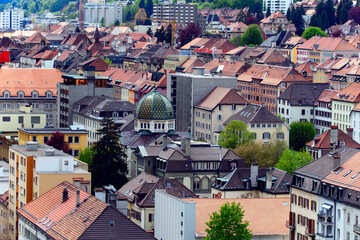 Fototapeta na wymiar Geometrically designed city of La Chaux-de-Fonds, in front cupola of Synagogue, UNESCO World Heritage, city known for watch-making industry and its urban concept, Watch Valley, Neuchâtel, Switzerland